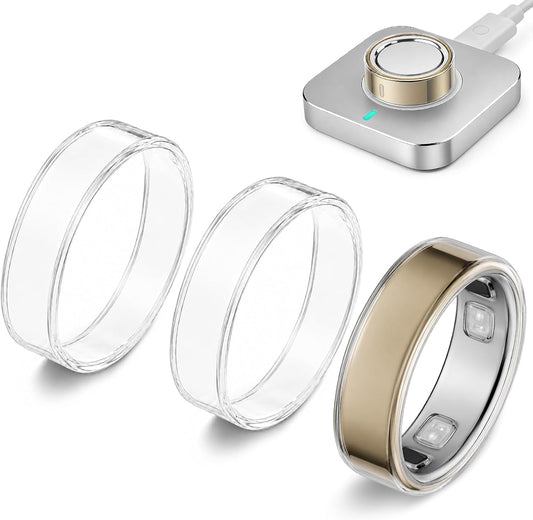 Three transparent 0.5mm TPU covers for Oura Ring 5 beside a gold ring on its charger