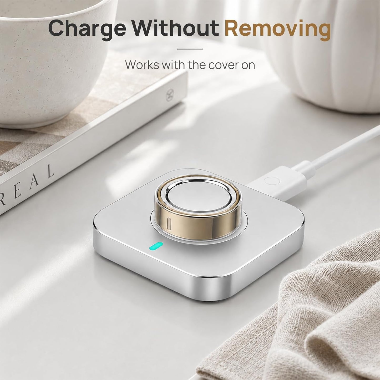 Oura Ring 5 charging with the transparent TPU cover on