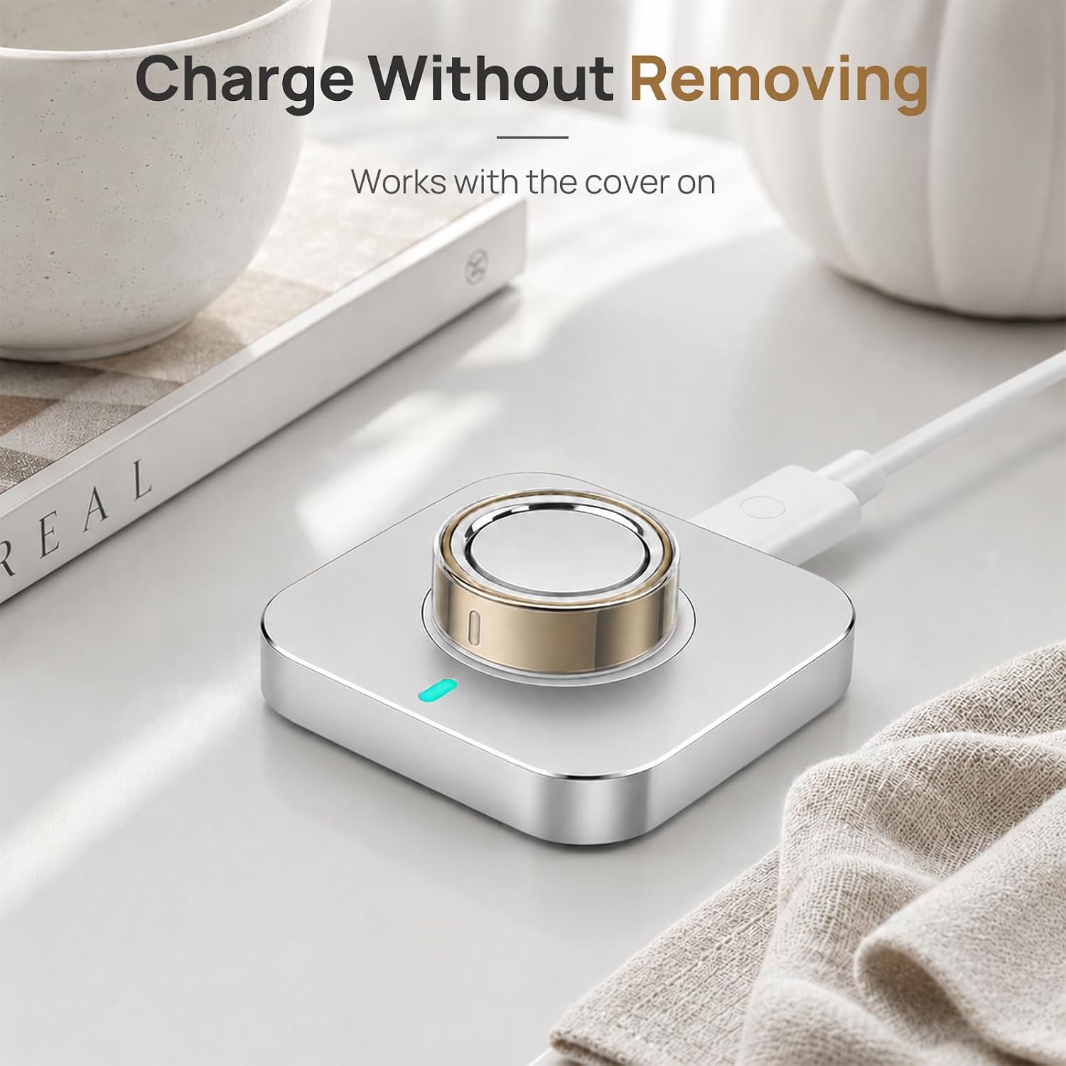 Oura Ring 5 charging with the transparent TPU cover on