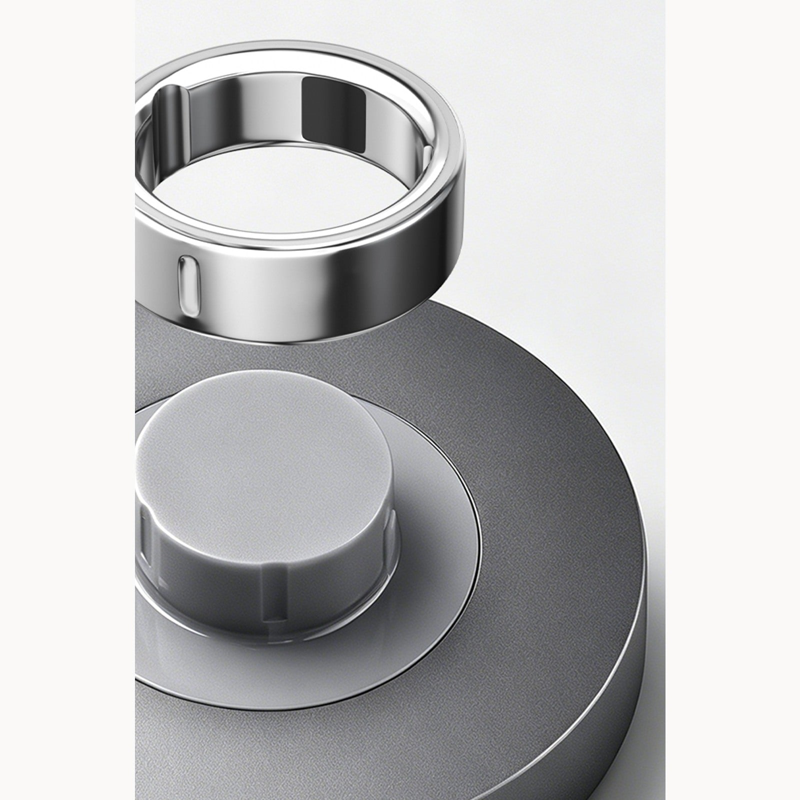 Oura Ring 4 charger showing size-specific dock fit