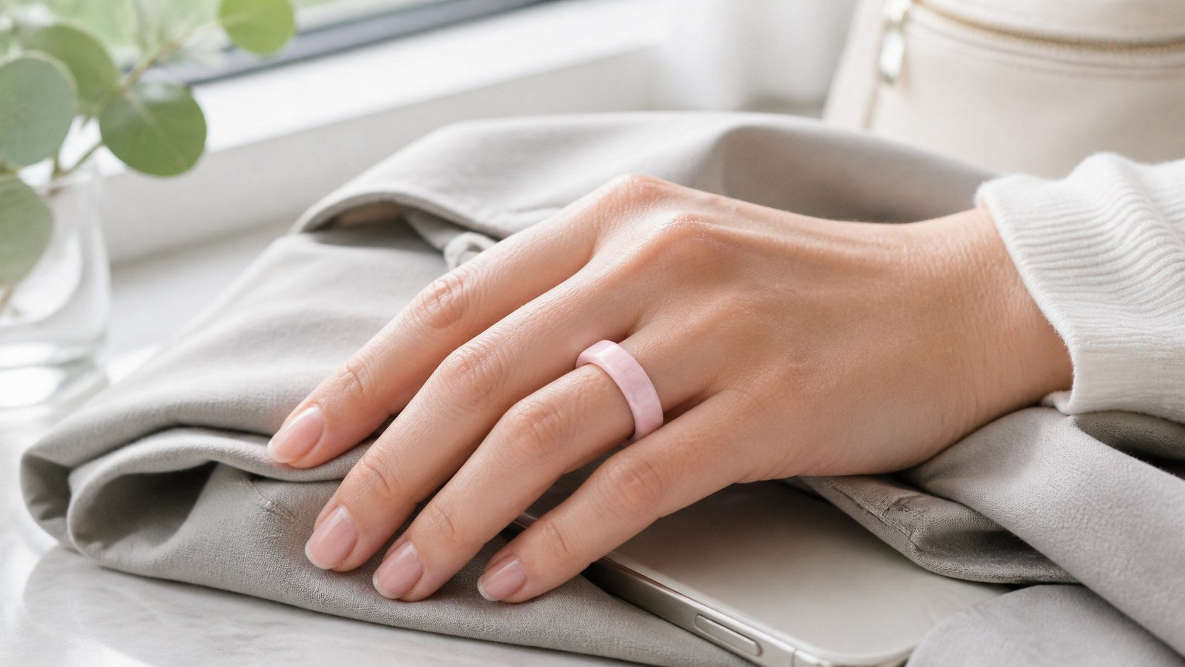 Bandsmith Petal ceramic-color painted TPU Oura Ring cover styled with a soft everyday outfit